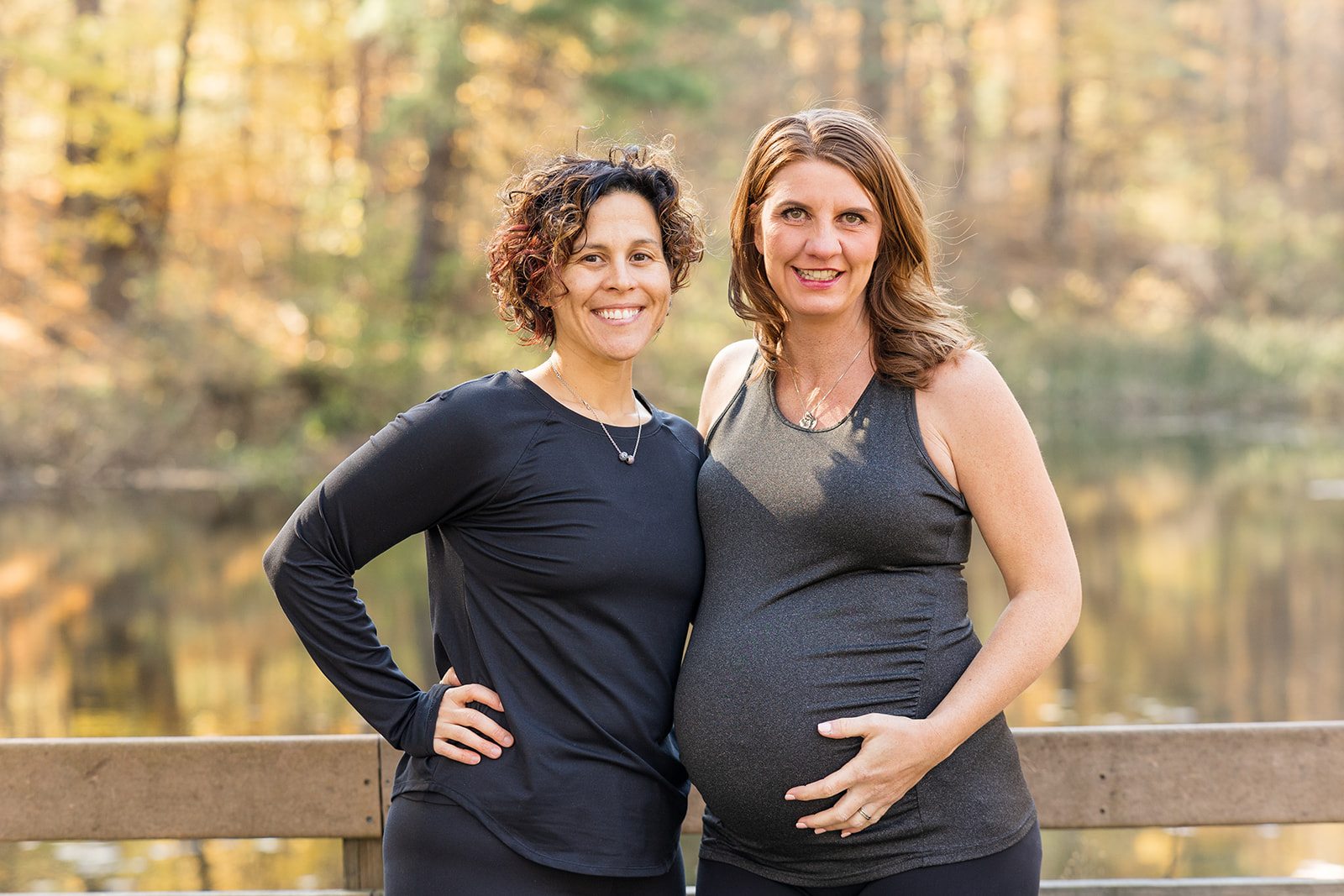 Lisa and a pregnant client outdoors
