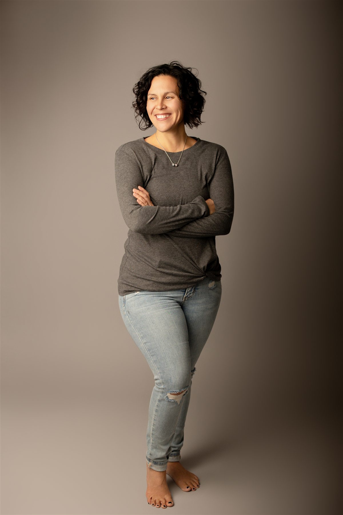 Lisa smiling, prenatal yoga instructor